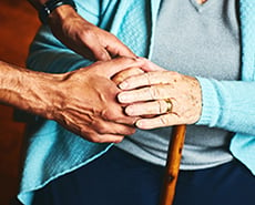 caregiver-holding-hands-with-senior